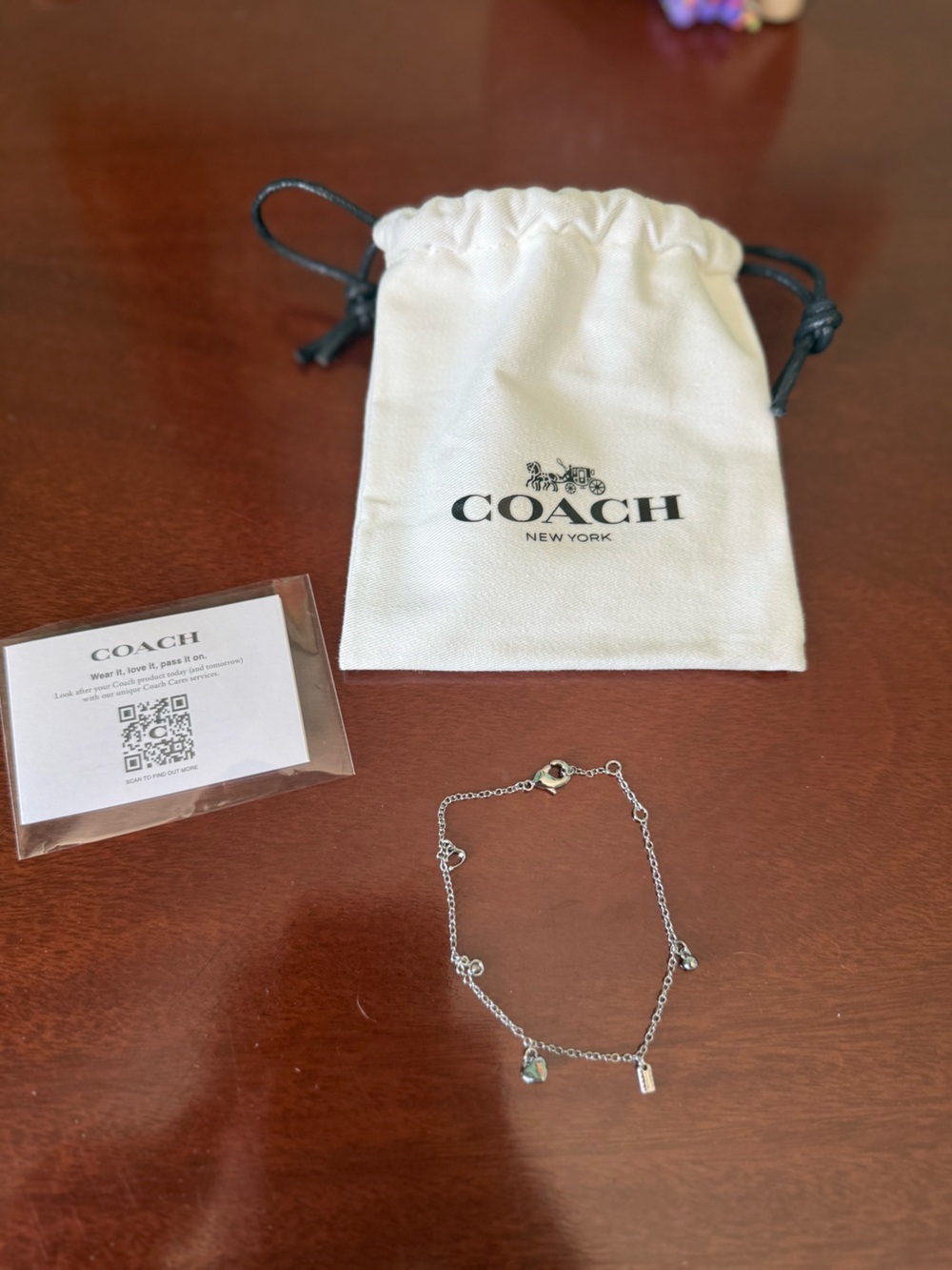 Coach Silver Heart & Charm Dangle Bracelet - Picture 2 of 2